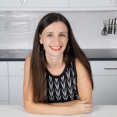 Maya in her Wholesome Yum kitchen.